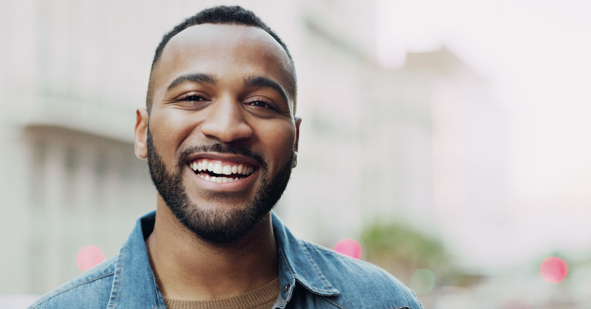 Man with healthy enamel smiling 