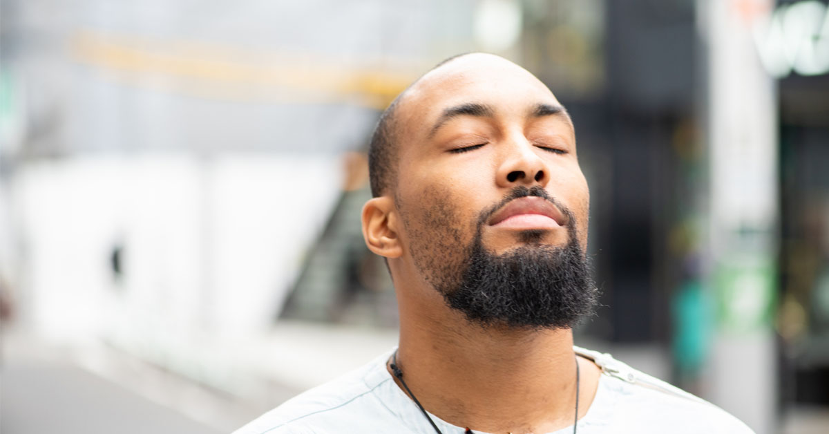 a Black man takes the time to practice mindfulness and be in the moment