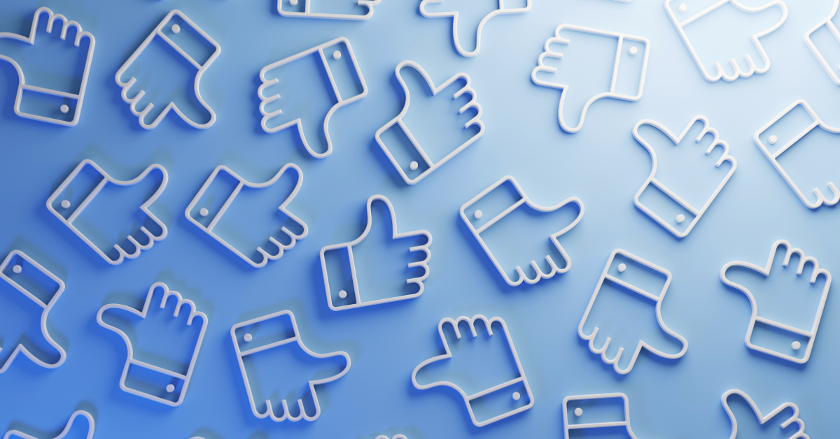 Blue background with various white thumbs up signs scattered in different angles.